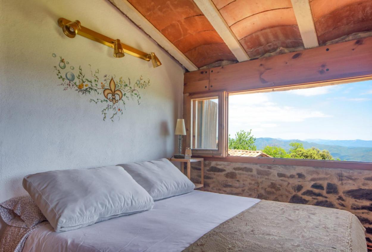 Apartamento duplex rural con chimenea y vistas panorámicas desde la cama Sant Marti Sacalm Esterno foto